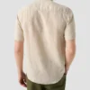beige solid short sleeve linen shirt 2025 05 23T12404935Z.webp