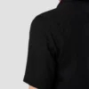 black solid short sleeve linen shirt 2025 05 23T123550557Z.webp