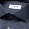 wide spread blue flanell shirt 2023 11 14T160549549Z.webp
