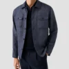 dark blue horisontal striped fine knit polo shirt 2025 06 18T110055173Z.webp