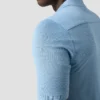 light blue filo di scozia solid pique 2024 12 09T080050488Z.webp