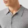 light grey horisontal striped fine knit polo shirt 2025 06 18T110054837Z.webp